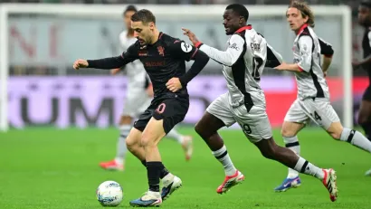 REUTERS/Daniele Mascolo, Travis Register-Imagn Images