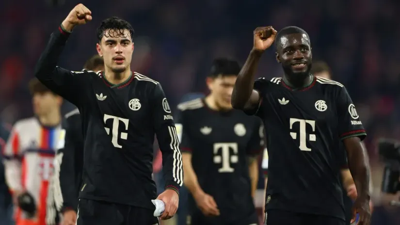 Pavlović i Umapecano. REUTERS/Thilo Schmuelgen